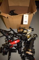 Lot 1173 - A box containing twelve modern spinning reels;...