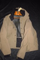 Lot 1196 - A fisherman's wading jacket in grey material...