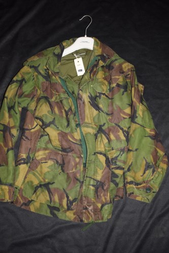 Lot 1198 - A military style camouflaged jacket unmarked...