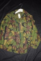Lot 1198 - A military style camouflaged jacket unmarked...