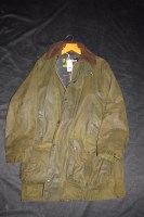Lot 1200 - A Barbour wax cotton jacket with corduroy...
