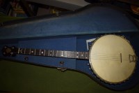 Lot 1210 - John Gray & Sons, London: a four string banjo,...