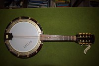 Lot 1214 - A Dallas banjo ukelele, 60cms long.