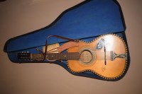 Lot 1224 - A Sicilian inlaid guitar by G. Indelicato...