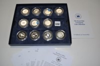 Lot 1292 - A set of eleven silver proof fifty pence's,...