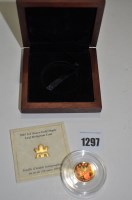 Lot 1297 - A 1/4oz. gold maple leaf hologram coin, 2001, -...