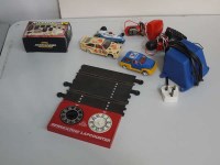 Lot 4 - A quantity of Scalextric cars; accessories;...