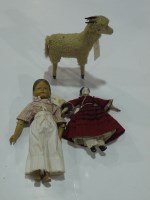 Lot 11 - An early 20th Century pull along sheep toy, 10...