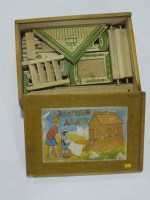 Lot 12 - A Russian block-build cottage toy, in original...