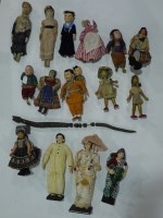Lot 17 - A collection of dolls from around the world,...