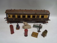 Lot 23 - A Hornby 0-gauge train set, including: coaches;...