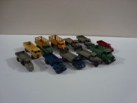 Lot 153 - Ten Dinky Toys trucks with slatted, timber and...