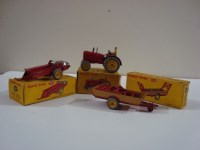 Lot 155 - Three boxed Dinky Toys agricultural vehicles,...