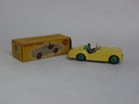 Lot 178 - A Dinky Toys Triumph TR2 sports car, cream...