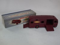 Lot 185 - A Dinky Super Toys horse box, maroon with...