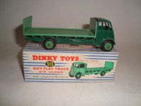 Lot 194 - A Dinky Toys Guy flat truck with tailboard,...