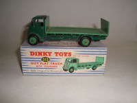 Lot 195 - A Dinky Toys Guy flat truck with tailboard,...