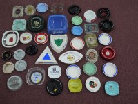 Lot 300 - A large collection of ashtrays from pubs,...