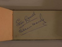 Lot 400 - A small autograph book bearing various...