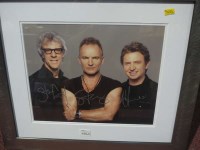 Lot 406A - A signed photograph of The Police, with...