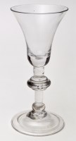 Lot 328 - Baluster wine glass, the bell bowl above...