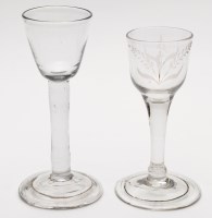 Lot 330 - Two plain stem wine or cordial glasses, folded...