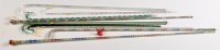 Lot 335 - Nine glass walking sticks, comprising: three...