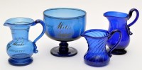 Lot 357 - Blue glass sugar bowl and cream of 'North-East'...