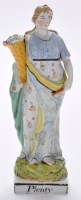 Lot 371 - Pearlware figure of ''Plenty'', as young lady...