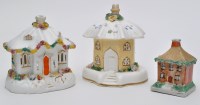 Lot 380 - Two pastille burner cottages, each with...