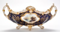 Lot 402 - Coalport topographical blue ground boat-shaped...