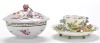 Lot 424 - Meissen style teacup and saucer, with applied...