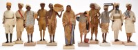 Lot 436 - Eleven Indian clay figures, depicting servants...