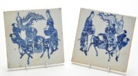 Lot 449 - Two Chinese blue and white tiles, each painted...