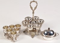 Lot 516 - An unusual EPNS plated cruet stand, by James...