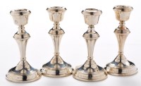 Lot 531 - Four Elizabeth II candlesticks, by W.I....