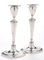 Lot 533 - A pair of George V candlesticks, by Hawksworth,...