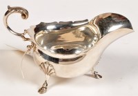 Lot 542 - A George V gravy boat, by Walker & Hall,...