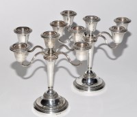 Lot 550 - A pair of Elizabeth II five light candelabra,...