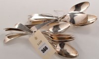 Lot 566 - Eleven George III dessert spoons, by John...