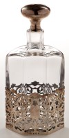 Lot 621 - A George V glass decanter with pierced silver...