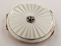 Lot 647 - An Elizabeth II silver and enamel compact, by...