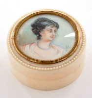 Lot 648 - A 19th Century circular ivory box and cover,...