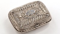 Lot 651 - A white metal filigree pattern cigarette case,...