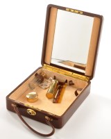 Lot 652 - A George V silver gilt part vanity set,...