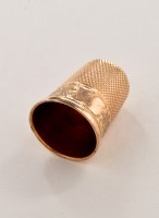 Lot 654 - A 15ct. gold thimble, by Henry Griffith & Sons...