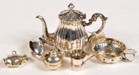 Lot 662 - An Italian silver miniature coffee pot, 5in....