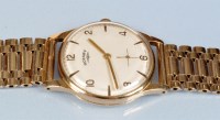 Lot 683 - Rotary: a gentleman's 9ct. gold wristwatch,...