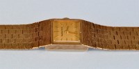 Lot 689 - Bueche-Girod: a lady's 9ct. gold wristwatch,...