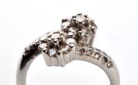 Lot 712 - A diamond double cluster ring, each cluster...